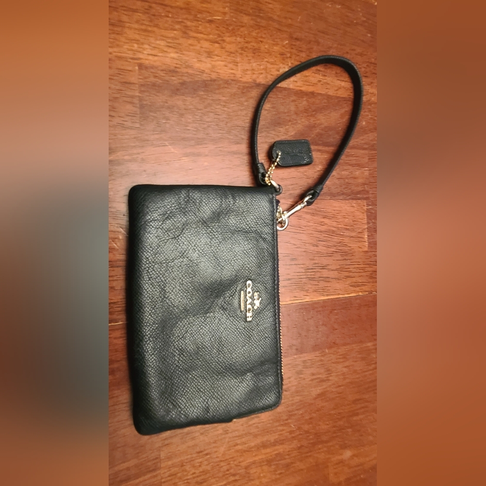 Black Coach zip-up wristlet wallet